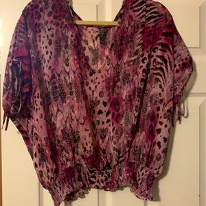 Very pretty sheer top.